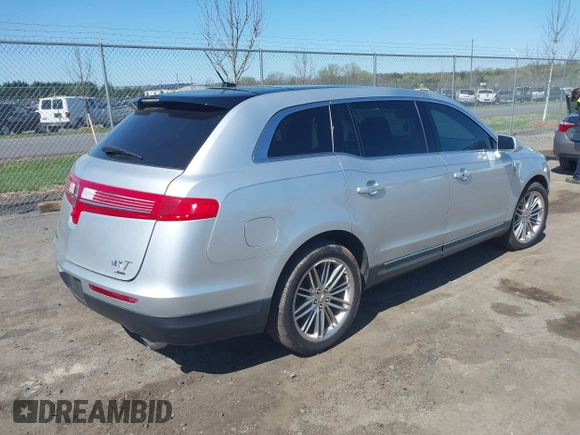 2015 Lincoln MKT EcoBoost with VIN 2LMHJ5AT4FBL00959, listed as a IAAI auction lot 41991763 with 159,687 mi miles and . Bid and sale history available at DreamBid. Image 4.
