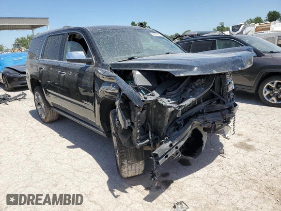 2015 Chevrolet Tahoe LTZ z VIN 1GNSKCKC8FR506151, wystawiony jako Copart lot #59948174 z przebiegiem Nie podano mil oraz Szkoda całkowita • Salvage title. Historia ofert i sprzedaży dostępna na DreamBid. Obrazek 4.