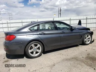 2015 BMW 4 Series 428i z VIN WBA4A5C53FG051038, wystawiony jako Copart lot #54909705 z przebiegiem 101 536 mil mil oraz Nie do naprawy • Non repairable. Historia ofert i sprzedaży dostępna na DreamBid. Obrazek 3.