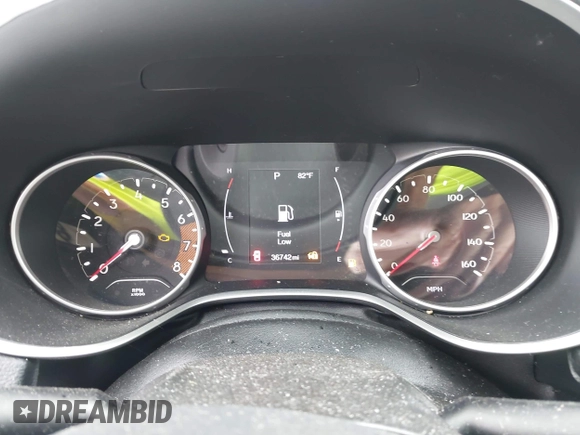 2020 Jeep Compass Latitude z VIN 3C4NJDBB9LT129693, wystawiony jako IAAI lot #42238631 z przebiegiem 36 742 mil mil oraz . Historia ofert i sprzedaży dostępna na DreamBid. Obrazek 7.