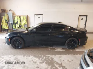 2015 Dodge Charger SXT z VIN 2C3CDXHG2FH741643, wystawiony jako IAAI lot #42321498 z przebiegiem 180 351 mil mil oraz . Historia ofert i sprzedaży dostępna na DreamBid. Obrazek 14.