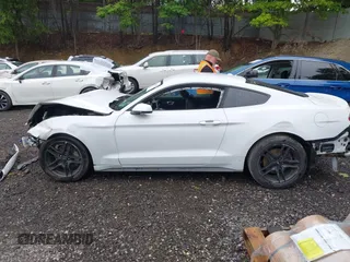 2018 Ford Mustang EcoBoost z VIN 1FA6P8TH2J5184938, wystawiony jako IAAI lot #42359873 z przebiegiem 80 965 mil mil oraz . Historia ofert i sprzedaży dostępna na DreamBid. Obrazek 15.