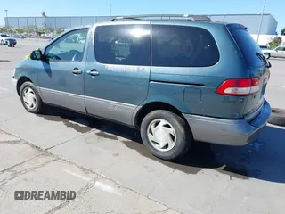 2002 Toyota Sienna LE with VIN 4T3ZF13C02U442678, listed as a IAAI auction lot 42241435 with 218,501 mi miles and . Bid and sale history available at DreamBid. Image 3.