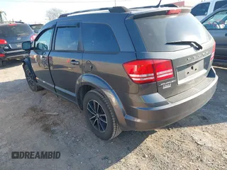 2018 Dodge Journey SE with VIN 3C4PDCAB4JT295807, listed as a IAAI auction lot 41743064 with 105,836 mi miles and . Bid and sale history available at DreamBid. Image 3.