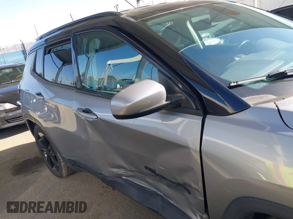 2020 Jeep Compass Latitude w/Sun/Safety Pkg with VIN 3C4NJCBB1LT102627, listed as a IAAI auction lot 41657827 with 68,371 mi miles. Bid and sale history available at carsss.com. Image 6.