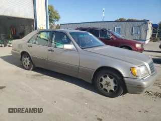 1995 Mercedes-Benz S 320 with VIN WDBGA32E6SA256435, listed as a Copart auction lot 77104234 with 309,498 mi miles and Clean Title. Bid and sale history available at DreamBid. Image 4.
