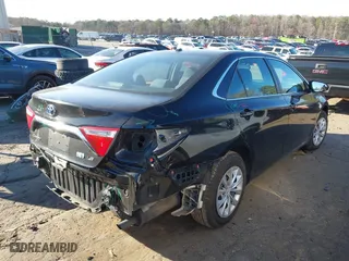 2015 Toyota Camry Hybrid LE with VIN 4T1BD1FK7FU167027, listed as a IAAI auction lot 41697235 with 253,152 mi miles. Bid and sale history available at carsss.com. Image 4.