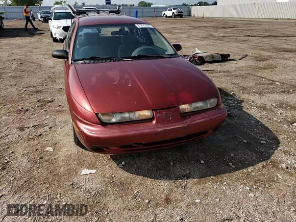1999 Saturn SW z VIN 1G8ZK827XXZ348270, wystawiony jako Copart lot #67872244 z przebiegiem 110 936 mil mil oraz Szkody całkowita. Historia ofert i sprzedaży dostępna na DreamBid. Obrazek 12.