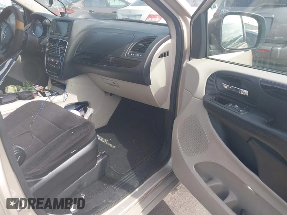 2014 Dodge Grand Caravan SXT z VIN 2C4RDGCG6ER162533, wystawiony jako IAAI lot #42251591 z przebiegiem 70 666 mil mil oraz . Historia ofert i sprzedaży dostępna na DreamBid. Obrazek 5.