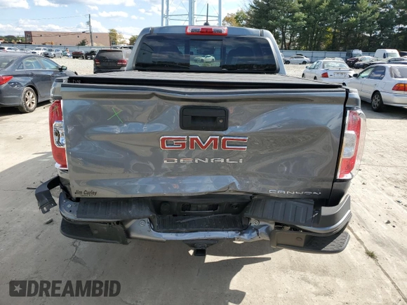 2022 GMC Canyon 4WD Denali with VIN 1GTG6EENXN1284835, listed as a Copart auction lot 75321594 with 7,419 mi miles and Salvage Title. Bid and sale history available at carsss.com. Image 6.