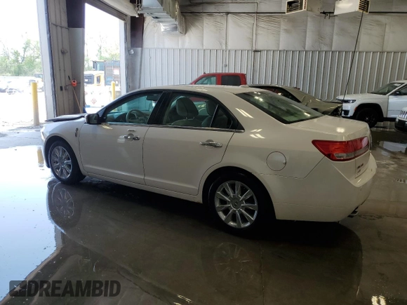 2010 Lincoln MKZ with VIN 3LNHL2JC1AR752317, listed as a Copart auction lot 56758355 with 214,604 mi miles and Non repairable. Bid and sale history available at DreamBid. Image 2.