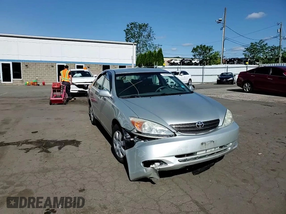 2004 Toyota Camry LE z VIN JTDBE32K640270298, wystawiony jako Copart lot #58800955 z przebiegiem 79 064 mil mil oraz Szkoda całkowita • Salvage title. Historia ofert i sprzedaży dostępna na DreamBid. Obrazek 13.