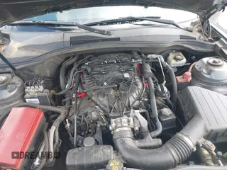 2013 Chevrolet Camaro LS z VIN 2G1FA1E39D9206888, wystawiony jako IAAI lot #42170703 z przebiegiem 169 661 mil mil oraz . Historia ofert i sprzedaży dostępna na DreamBid. Obrazek 10.