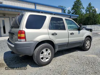 2004 Ford Escape XLT with VIN 1FMCU03134KB53192, listed as a Copart auction lot 62178075 with 223,637 mi miles and Salvage title. Bid and sale history available at DreamBid. Image 3.