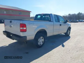 2005 Ford F-150 STX with VIN 1FTRX14W75FB45211, listed as a IAAI auction lot 41998529 with 325,970 mi miles. Bid and sale history available at carsss.com. Image 4.