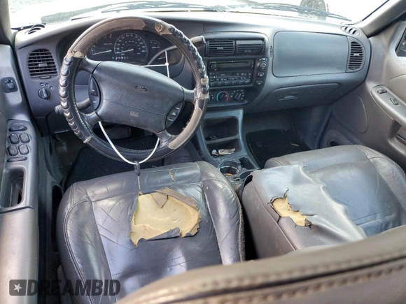 1999 Ford Explorer XLT z VIN 1FMZU32E4XUA16402, wystawiony jako Copart lot #85243074 z przebiegiem 148 110 mil mil oraz Szkoda całkowita • Salvage title. Historia ofert i sprzedaży dostępna na DreamBid. Obrazek 8.
