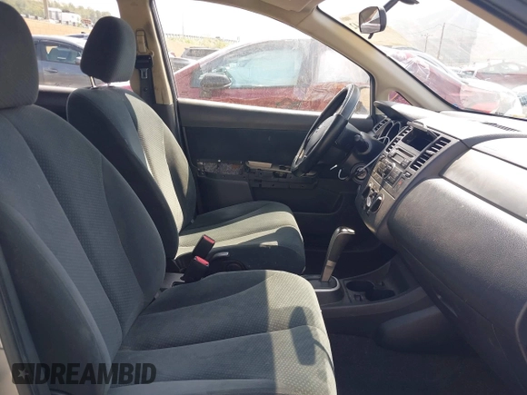 2010 Nissan Versa 1.8 SL with VIN 3N1BC1CP9AL368120, listed as a IAAI auction lot 42164642 with 223,380 mi miles. Bid and sale history available at carsss.com. Image 5.