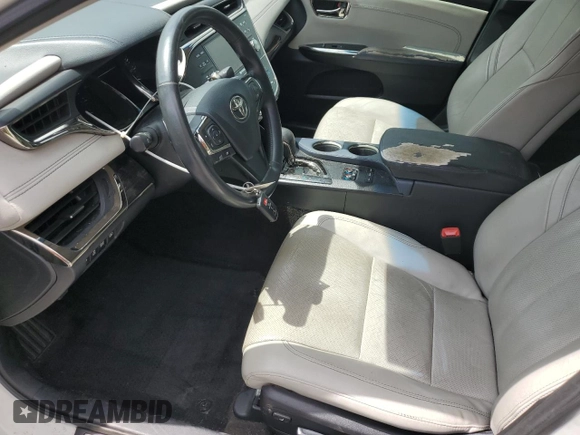 2013 Toyota Avalon XLE with VIN 4T1BK1EB2DU061038, listed as a Copart auction lot 63974195 with 122,432 mi miles and Salvage title. Bid and sale history available at DreamBid. Image 7.