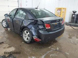 2014 Chevrolet Cruze 1LT with VIN 1G1PC5SB0E7112323, listed as a IAAI auction lot 41571759 with 191,477 mi miles and . Bid and sale history available at DreamBid. Image 3.