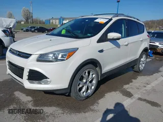 2013 Ford Escape Titanium with VIN 1FMCU0J96DUA71857, listed as a IAAI auction lot 41877003 with 118,864 mi miles and . Bid and sale history available at carsss.com. Image 19.