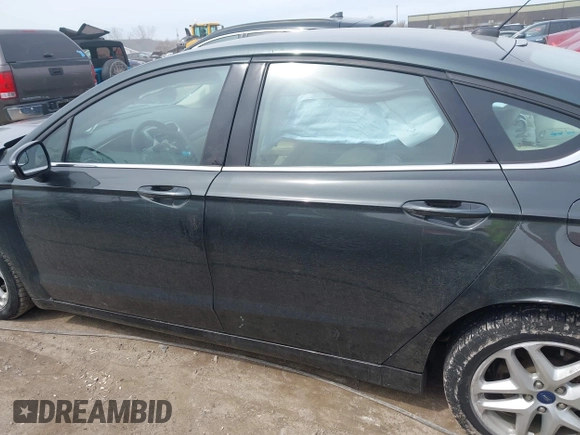2015 Ford Fusion SE with VIN 1FA6P0H73F5115572, listed as a IAAI auction lot 41985171 with Not Provided miles and . Bid and sale history available at DreamBid. Image 15.