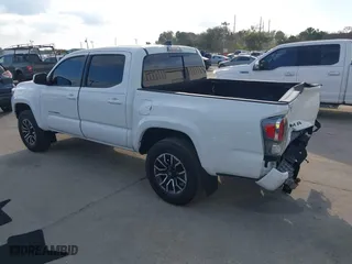2023 Toyota Tacoma 4WD SR with VIN 3TMCZ5AN9PM566739, listed as a IAAI auction lot 41513763 with 16,708 mi miles. Bid and sale history available at carsss.com. Image 3.