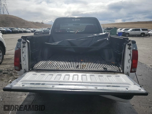 2002 Ford F-150 XL with VIN 1FTRF17212KC06180, listed as a Copart auction lot 45336625 with 214,139 mi miles and Salvage title. Bid and sale history available at DreamBid. Image 6.