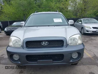 2002 Hyundai Santa Fe GLS with VIN KM8SC73D42U152166, listed as a IAAI auction lot 42088109 with 199,051 mi miles. Bid and sale history available at carsss.com. Image 6.