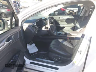 2016 Ford Fusion Titanium Hybrid with VIN 3FA6P0RU1GR259947, listed as a IAAI auction lot 41695377 with 97,605 mi miles. Bid and sale history available at carsss.com. Image 18.