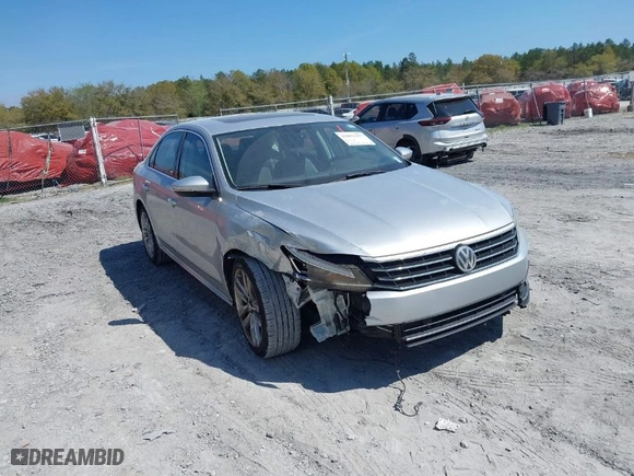 2017 Volkswagen Passat 1.8T SE w/Technology with VIN 1VWGT7A3XHC025096, listed as a IAAI auction lot 41891297 with 124,375 mi miles. Bid and sale history available at carsss.com. Image 1.