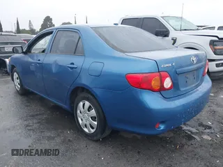 2009 Toyota Corolla with VIN JTDBL40E999052447, listed as a IAAI auction lot 41914900 with 133,676 mi miles. Bid and sale history available at carsss.com. Image 3.