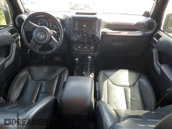 2014 Jeep Wrangler Unlimited Sahara z VIN 1C4BJWEG4EL164226, wystawiony jako Copart lot #53849355 z przebiegiem 82 145 mil mil oraz Szkoda całkowita • Salvage title. Historia ofert i sprzedaży dostępna na DreamBid. Obrazek 8.