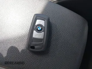 2015 BMW 3 Series 320i with VIN WBA3B1G58FNT03373, listed as a IAAI auction lot 41843859 with 98,439 mi miles. Bid and sale history available at carsss.com. Image 11.
