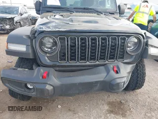 2024 Jeep Wrangler Rubicon with VIN 1C4PJXFG6RW337596, listed as a IAAI auction lot 41958788 with 15,942 mi miles and . Bid and sale history available at DreamBid. Image 6.