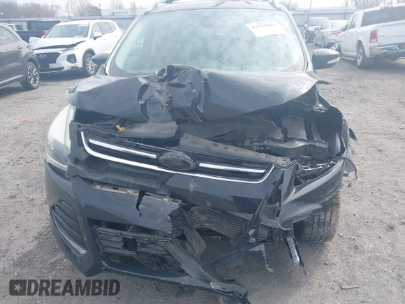2013 Ford Escape Titanium z VIN 1FMCU0J90DUB32703, wystawiony jako IAAI lot #41714424 z przebiegiem 127 639 mil mil oraz . Historia ofert i sprzedaży dostępna na DreamBid. Obrazek 6.