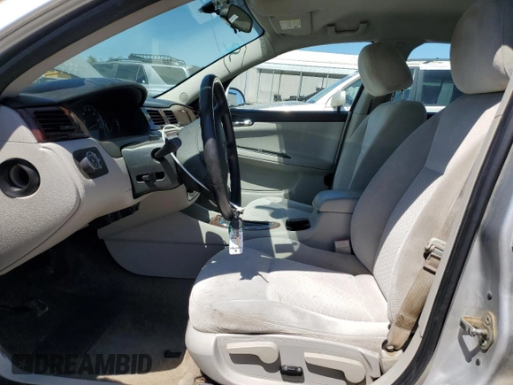 2011 Chevrolet Impala LT Fleet with VIN 2G1WG5EK1B1233818, listed as a Copart auction lot 65001935 with 134,364 mi miles and Salvage title. Bid and sale history available at DreamBid. Image 7.