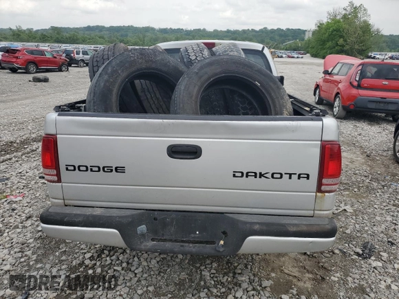 2004 Dodge Dakota Sport z VIN 1D7HG38K04S740136, wystawiony jako Copart lot #57356795 z przebiegiem 181 507 mil mil oraz Tytuł czysty. Historia ofert i sprzedaży dostępna na DreamBid. Obrazek 6.