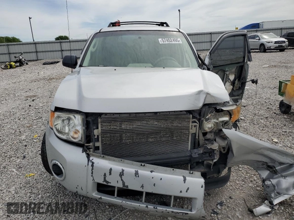 2009 Ford Escape XLS z VIN 1FMCU92789KB10338, wystawiony jako Copart lot #57452495 z przebiegiem 285 171 mil mil oraz Szkoda całkowita • Salvage title. Historia ofert i sprzedaży dostępna na DreamBid. Obrazek 5.