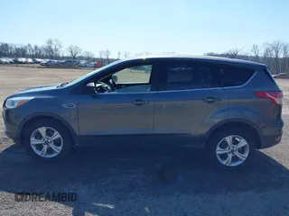 2015 Ford Escape SE with VIN 1FMCU9GX1FUC19376, listed as a IAAI auction lot 41769390 with 98,334 mi miles. Bid and sale history available at carsss.com. Image 14.