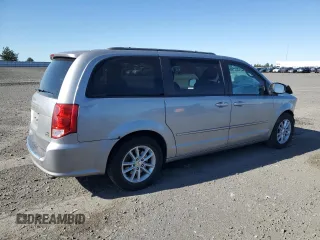 2014 Dodge Grand Caravan SXT with VIN 2C4RDGCG4ER478657, listed as a Copart auction lot 55691085 with 139,681 mi miles and Salvage Title. Bid and sale history available at DreamBid. Image 3.