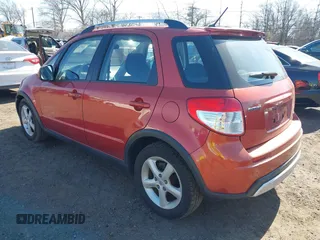 2009 Suzuki SX4 Man Touring Pkg AWD with VIN JS2YB417496201691, listed as a IAAI auction lot 41741746 with 172,369 mi miles. Bid and sale history available at carsss.com. Image 3.