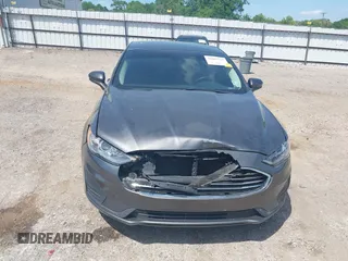 2020 Ford Fusion SE z VIN 3FA6P0H79LR118534, wystawiony jako IAAI lot #42065215 z przebiegiem 104 202 mil mil oraz . Historia ofert i sprzedaży dostępna na DreamBid. Obrazek 13.