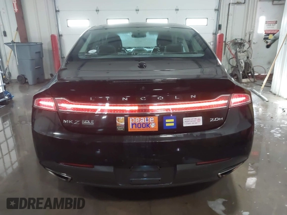 2013 Lincoln MKZ Hybrid z VIN 3LN6L2LU8DR818010, wystawiony jako IAAI lot #41363777 z przebiegiem 181 675 mil mil oraz . Historia ofert i sprzedaży dostępna na DreamBid. Obrazek 16.