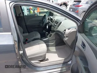 2012 Chevrolet Sonic LT with VIN 1G1JC5SH1C4182616, listed as a IAAI auction lot 42081899 with 92,802 mi miles and . Bid and sale history available at DreamBid. Image 5.