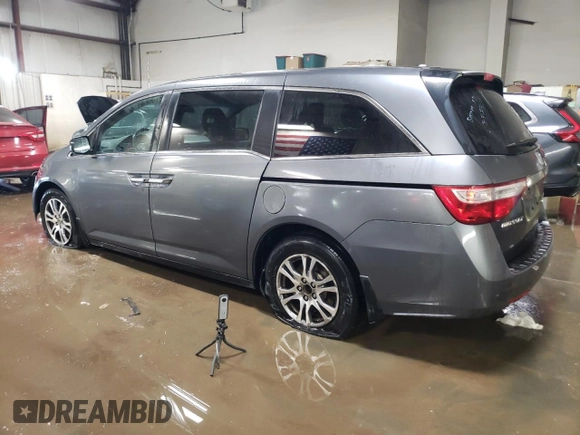 2012 Honda Odyssey EX-L with VIN 5FNRL5H69CB143572, listed as a Copart auction lot 48614255 with 114,490 mi miles and Salvage Title. Bid and sale history available at carsss.com. Image 2.