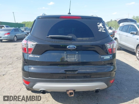 2017 Ford Escape Titanium with VIN 1FMCU0J91HUA75417, listed as a IAAI auction lot 42044170 with 116,431 mi miles. Bid and sale history available at carsss.com. Image 17.