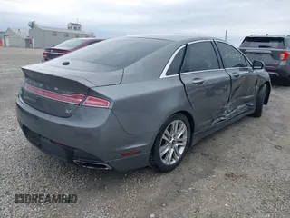 2014 Lincoln MKZ with VIN 3LN6L2GK2ER818577, listed as a IAAI auction lot 41929913 with 185,062 mi miles. Bid and sale history available at carsss.com. Image 4.