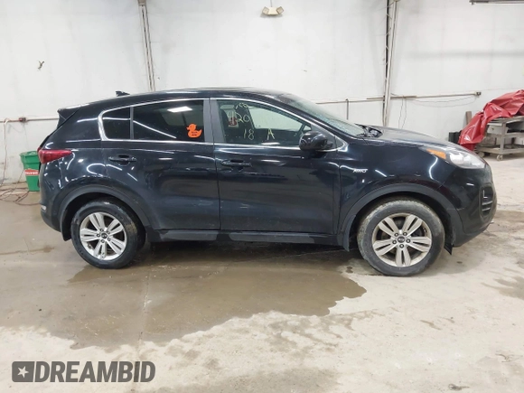 2018 Kia Sportage LX z VIN KNDPMCAC9J7351060, wystawiony jako IAAI lot #42011814 z przebiegiem 174 504 mil mil oraz . Historia ofert i sprzedaży dostępna na DreamBid. Obrazek 13.