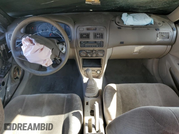 1999 Toyota Corolla VE with VIN 1NXBR12E9XZ158252, listed as a Copart auction lot 58757595 with 232,776 mi miles and Salvage title. Bid and sale history available at DreamBid. Image 8.