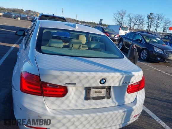 2014 BMW 3 Series 328i xDrive with VIN WBA3B5G58ENS08415, listed as a IAAI auction lot 41642668 with 51,563 mi miles and . Bid and sale history available at DreamBid. Image 16.